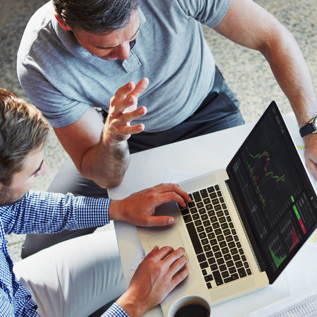 Men looking at exchange platform